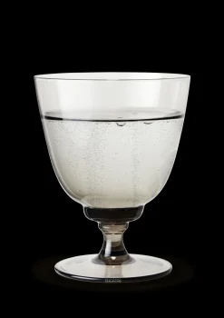 Holmegaard Glas på fod 35 cl i grå fra serien Flow | Køb her